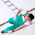 Young worker falling from the ladder